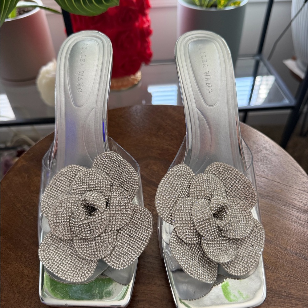 Elegant Silver Flower Embellished Mules by Clear Wang